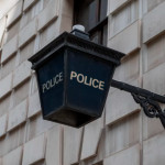 Unsplash - police station sign